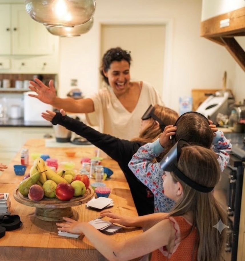 Paula celebrating with three blindfolded girls around the kitchen table